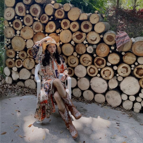 Tribal Women Wearing Ruffled Dresses - Image 2